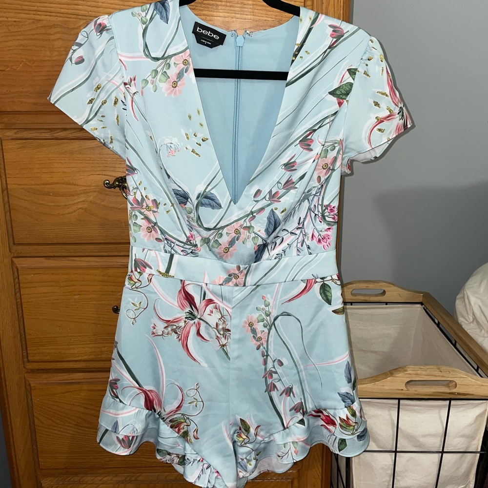 Worn once! Super cute Bebe romper. Size 4